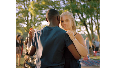 a man and a woman standing next to each other