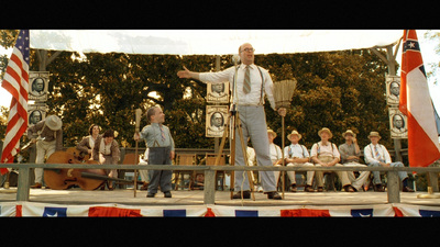 a man standing in front of a crowd of people