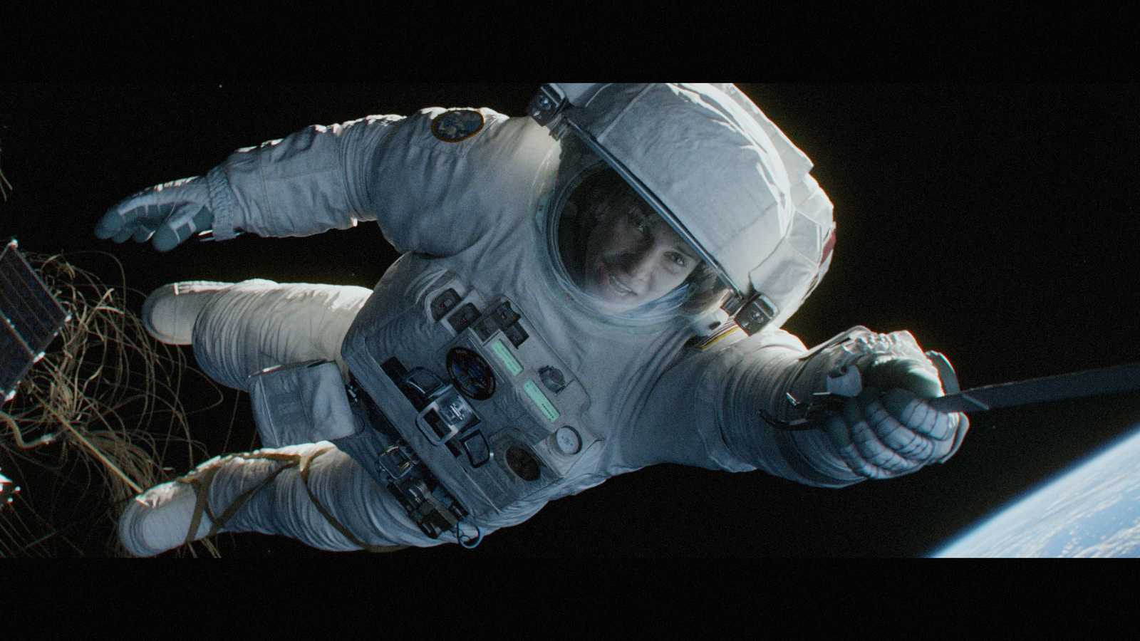 a man in a spacesuit floating in space