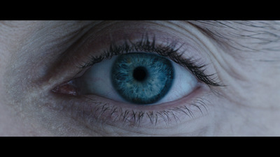 a close up of a person's blue eye