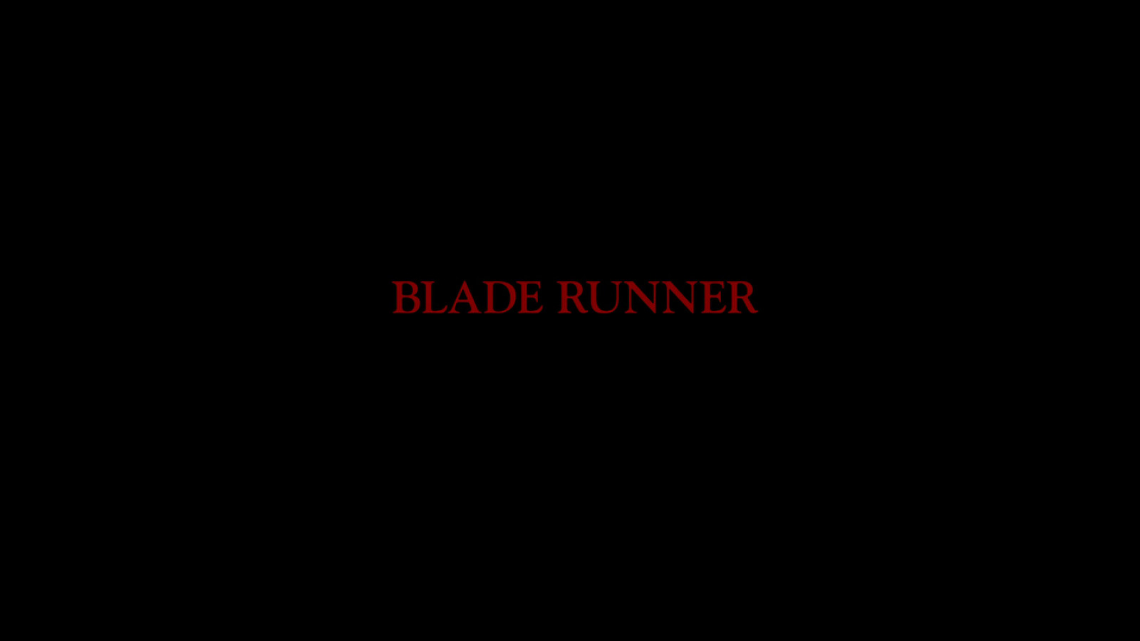 a black background with a red text that reads blade runner