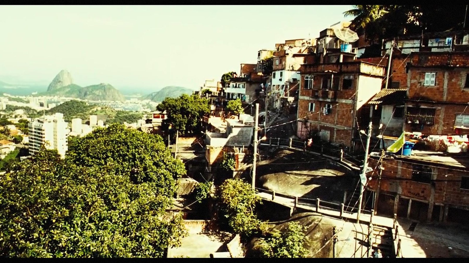 a view of a city with mountains in the background