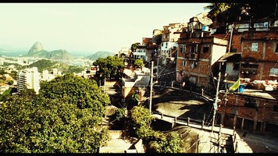 a view of a city with mountains in the background