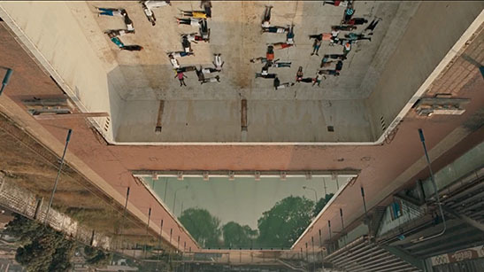 a group of people laying on the floor of a building