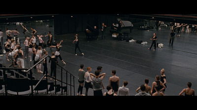 a group of people standing on top of a stage