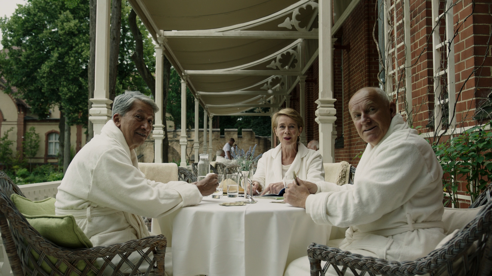 a group of people sitting around a table