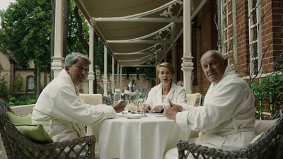 a group of people sitting around a table