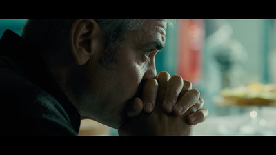 a man with his hands folded in prayer