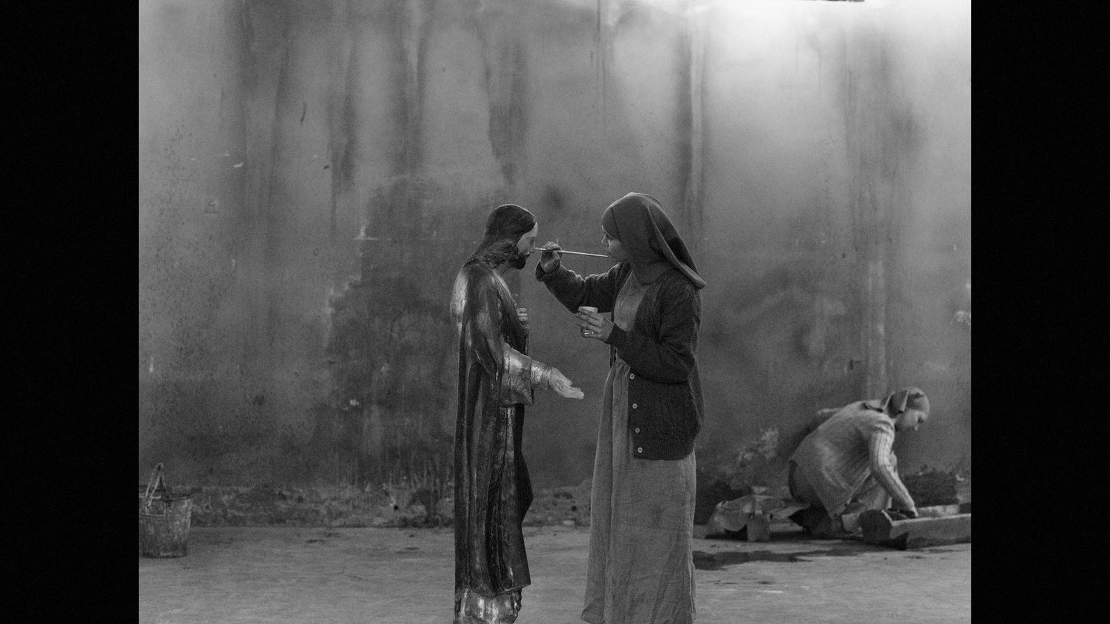 a black and white photo of two women