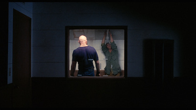 a man and a woman standing in a room