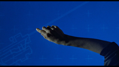 a person's hand reaching up into the sky