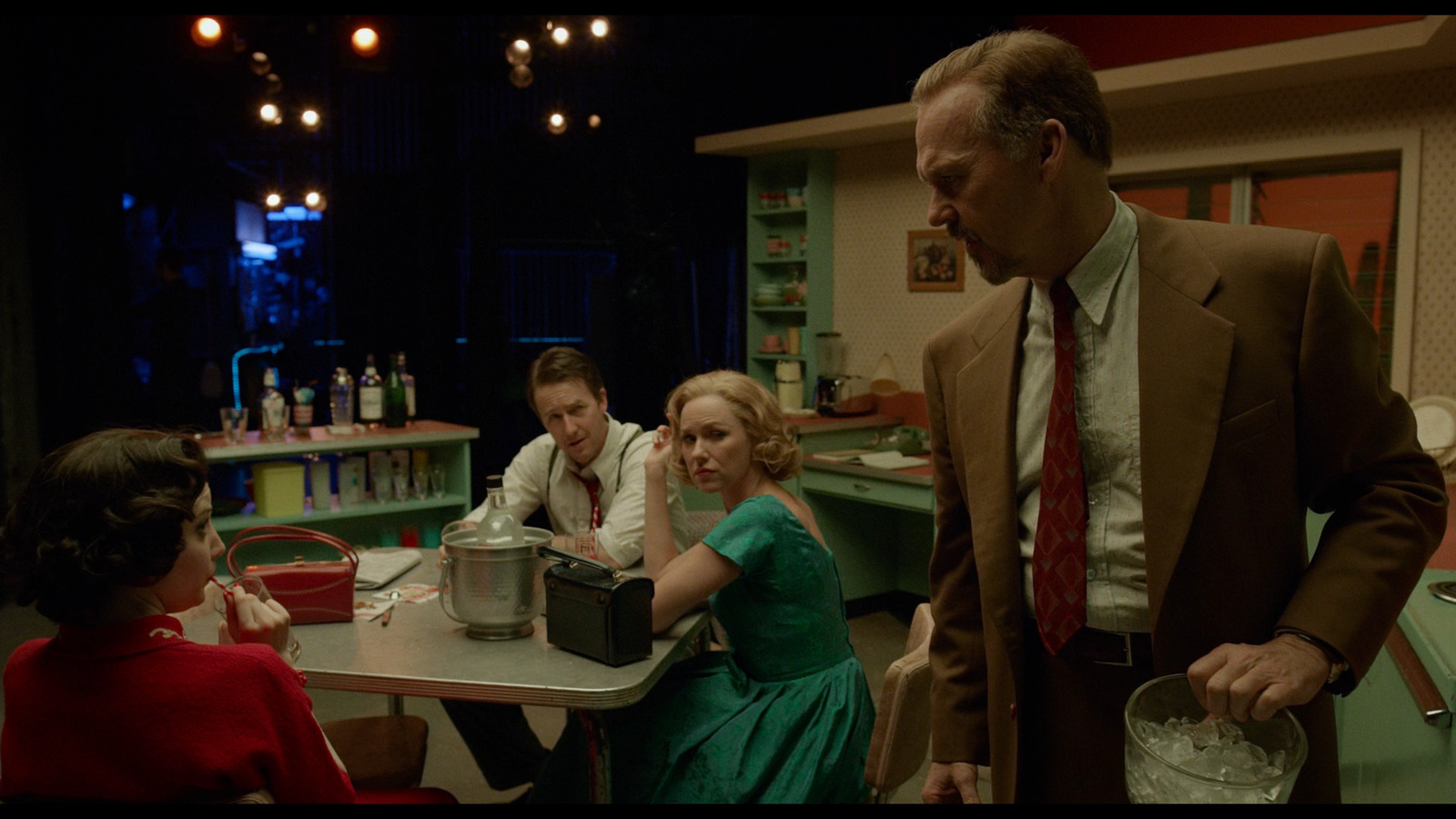 a group of people sitting around a table