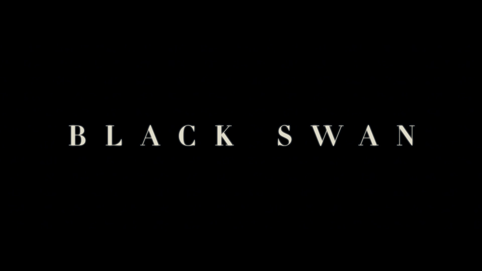 a black swan logo on a black background