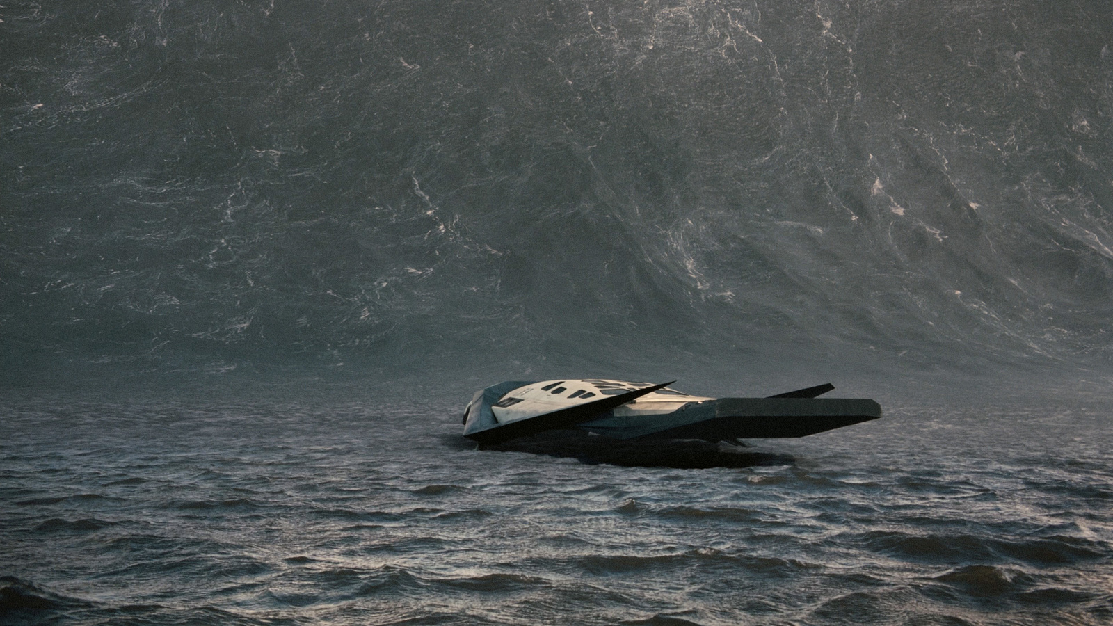 a space shuttle floating on top of a body of water