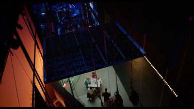 a group of people sitting at a table in a room