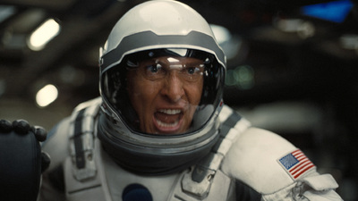 a close up of a person wearing a space suit