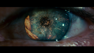 a close up of a person's eye with a lot of stars in the