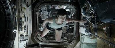 a woman standing inside of a space station