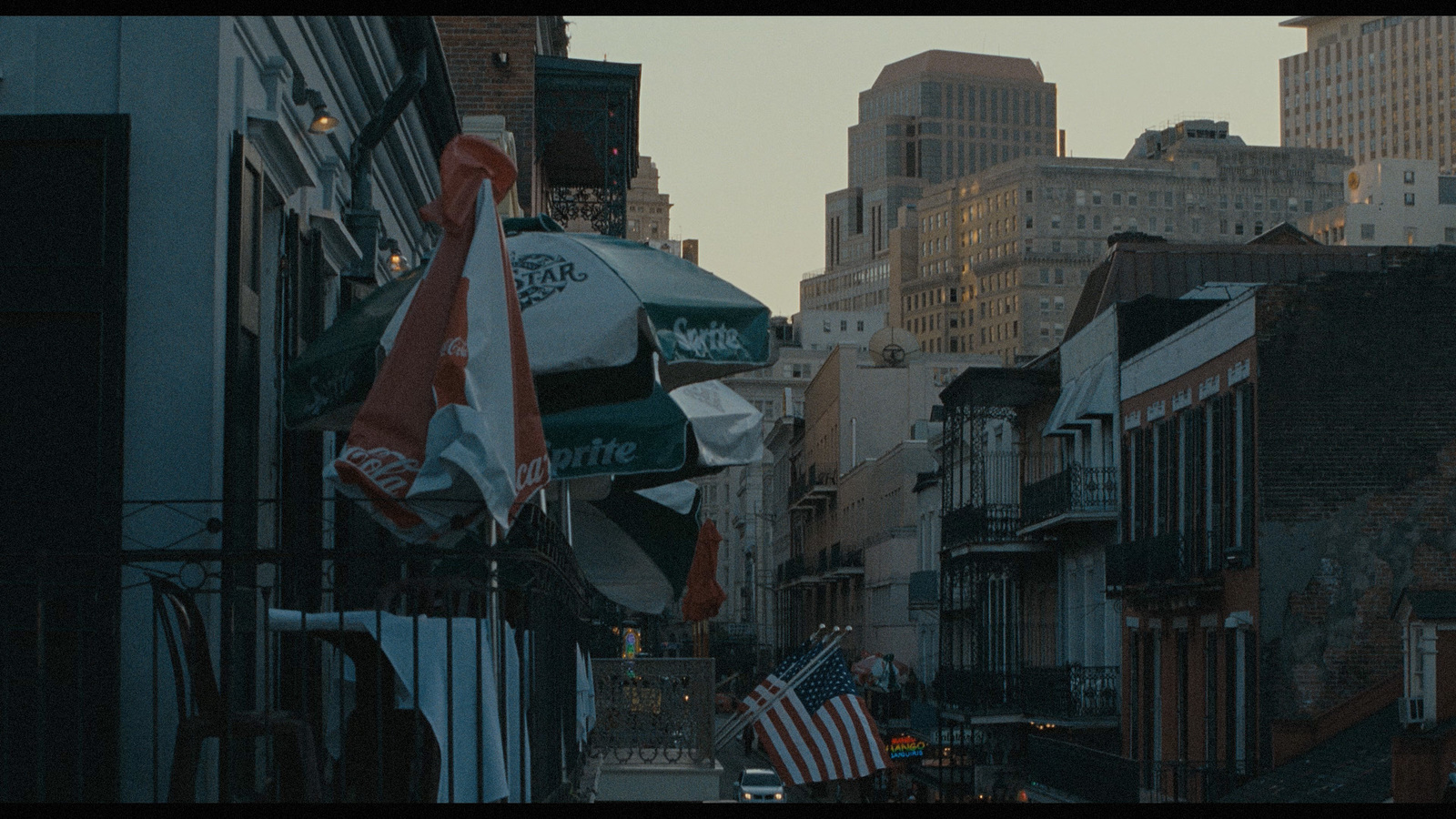 a city street filled with lots of tall buildings