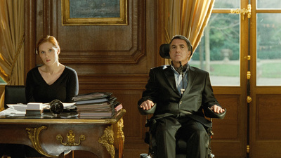 a man and a woman sitting at a desk