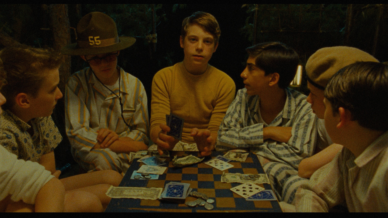 a group of young men playing a game of checkers