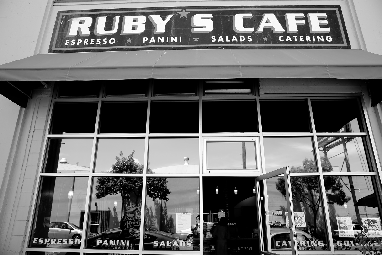 a black and white photo of the front of ruby's cafe