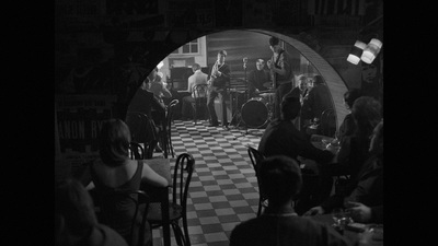 a group of people sitting around a table