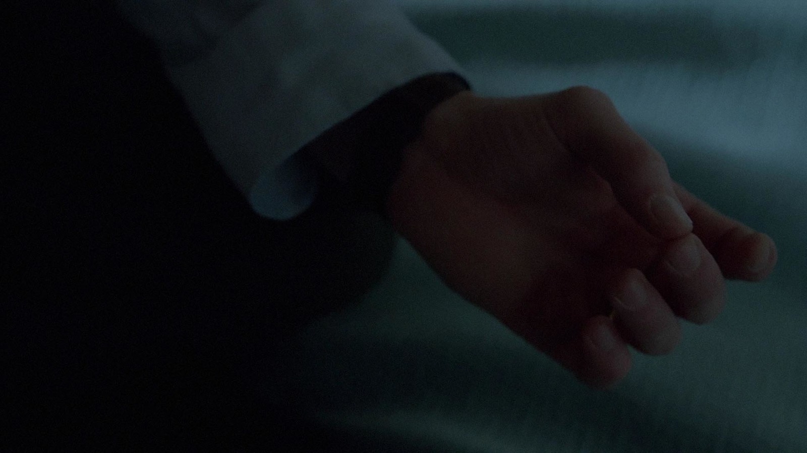 a close up of a person's hand holding another person's hand