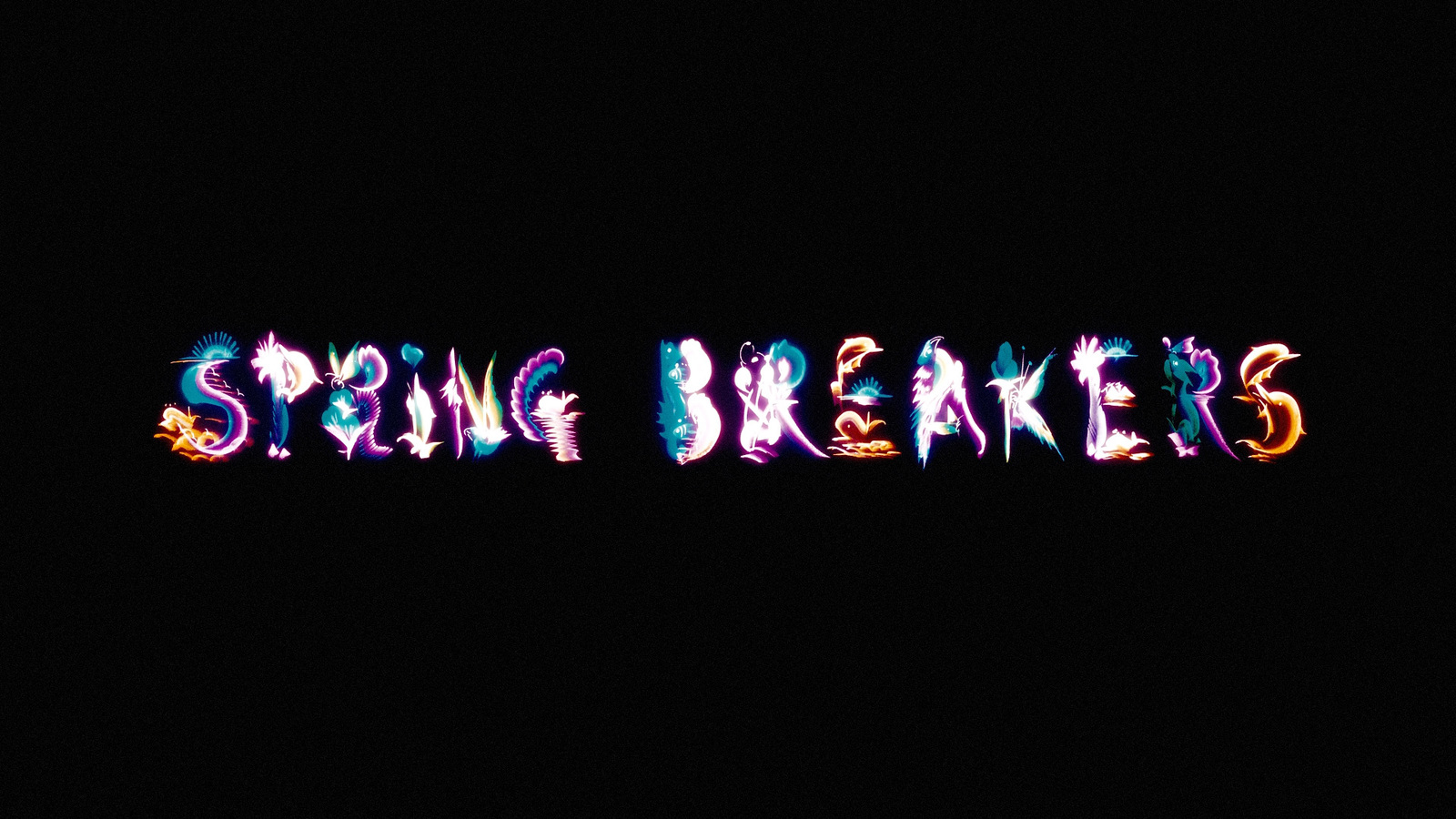 the word spring breakers written in neon lights