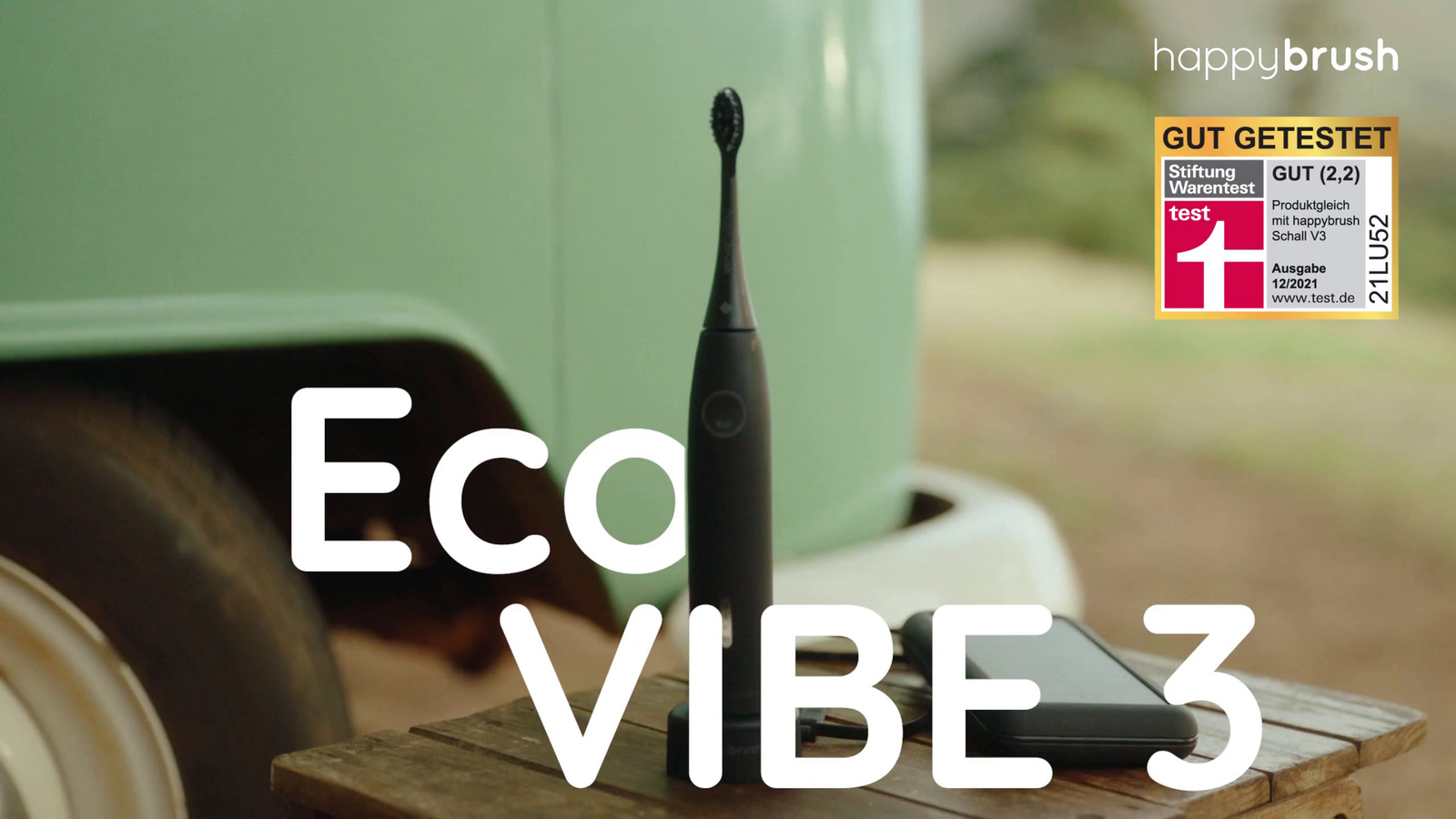 a cell phone sitting on top of a wooden table