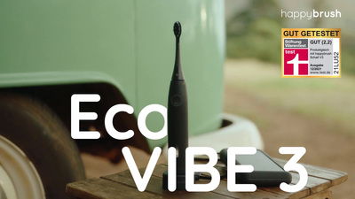 a cell phone sitting on top of a wooden table