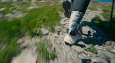 a person is walking on a rocky path