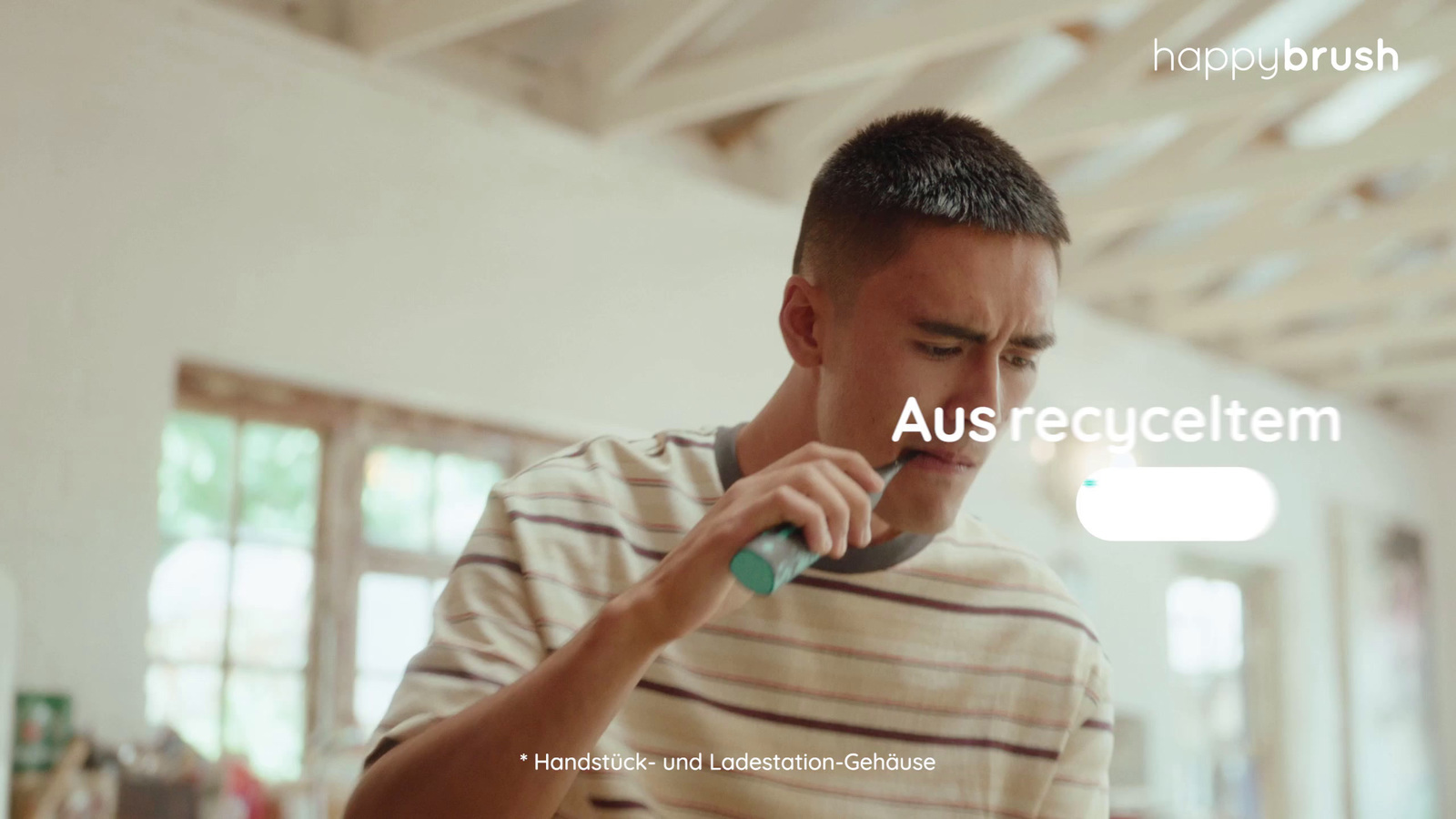 a man brushing his teeth with an electric toothbrush