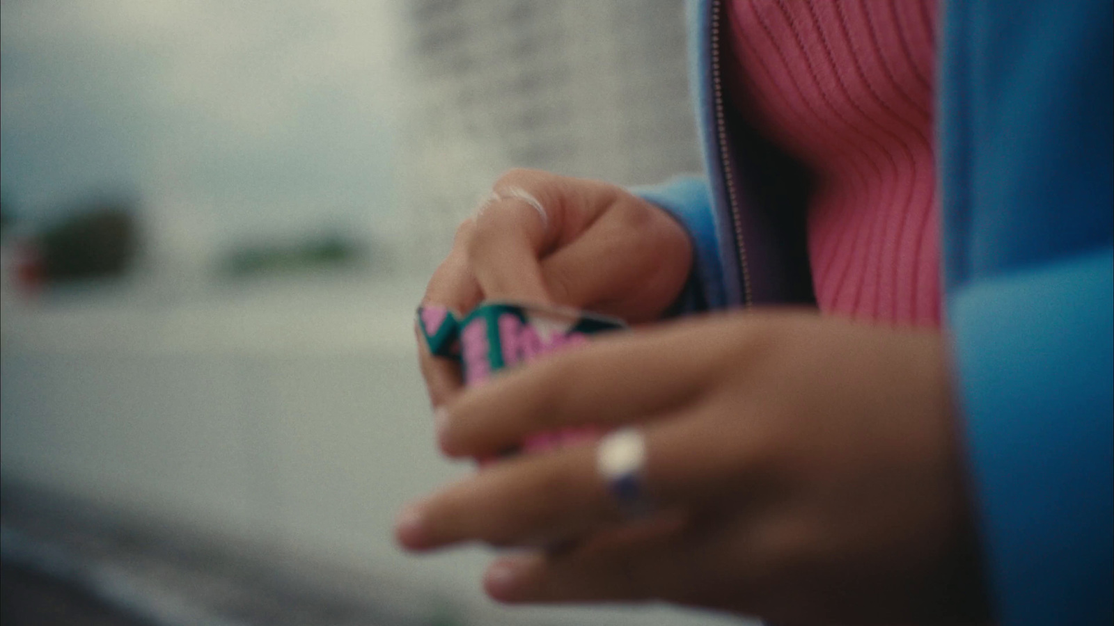 a close up of a person holding a cell phone