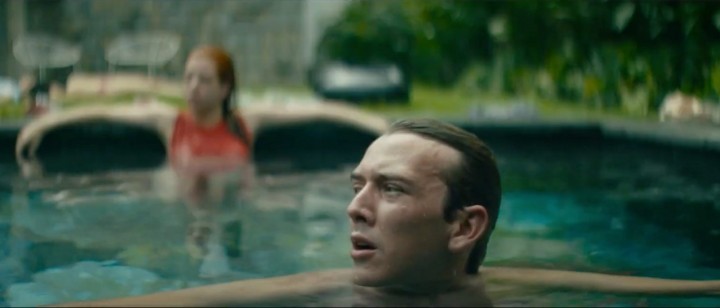 a man and a woman in a swimming pool