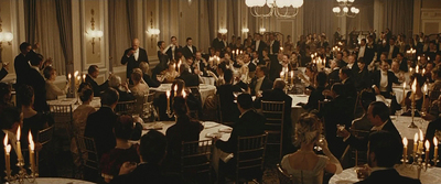 a group of people sitting around a dinner table