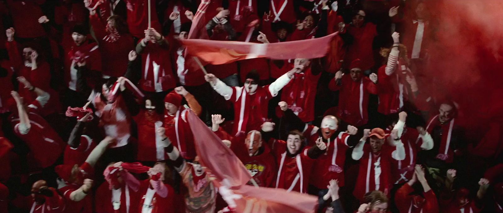 a large group of people in red and white robes