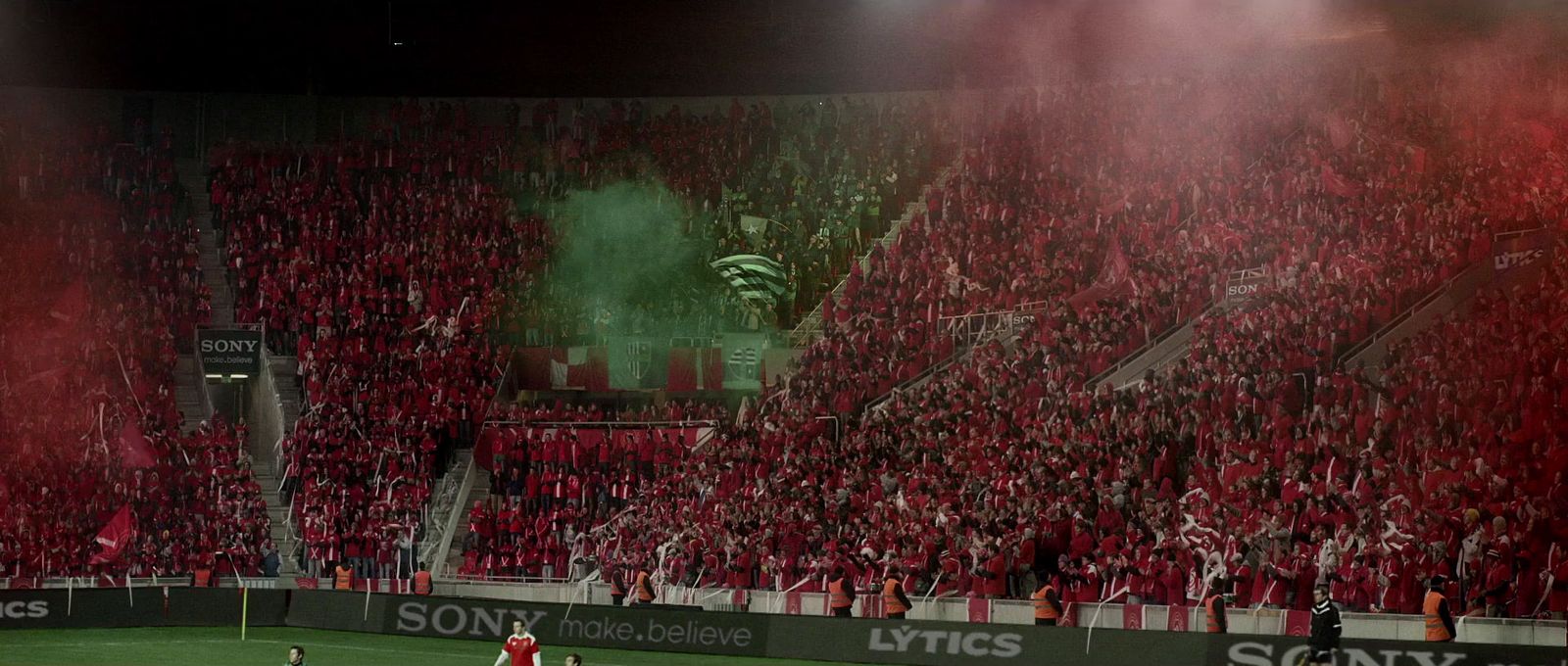 a soccer stadium filled with lots of people