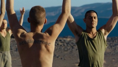 a group of men standing next to each other