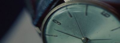 a close up of a watch on a person's wrist