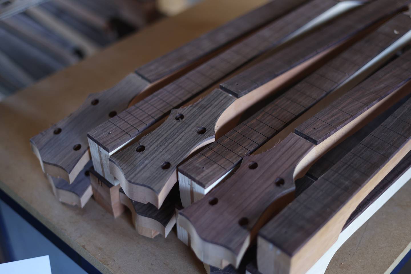 a close up of a bench made out of wood