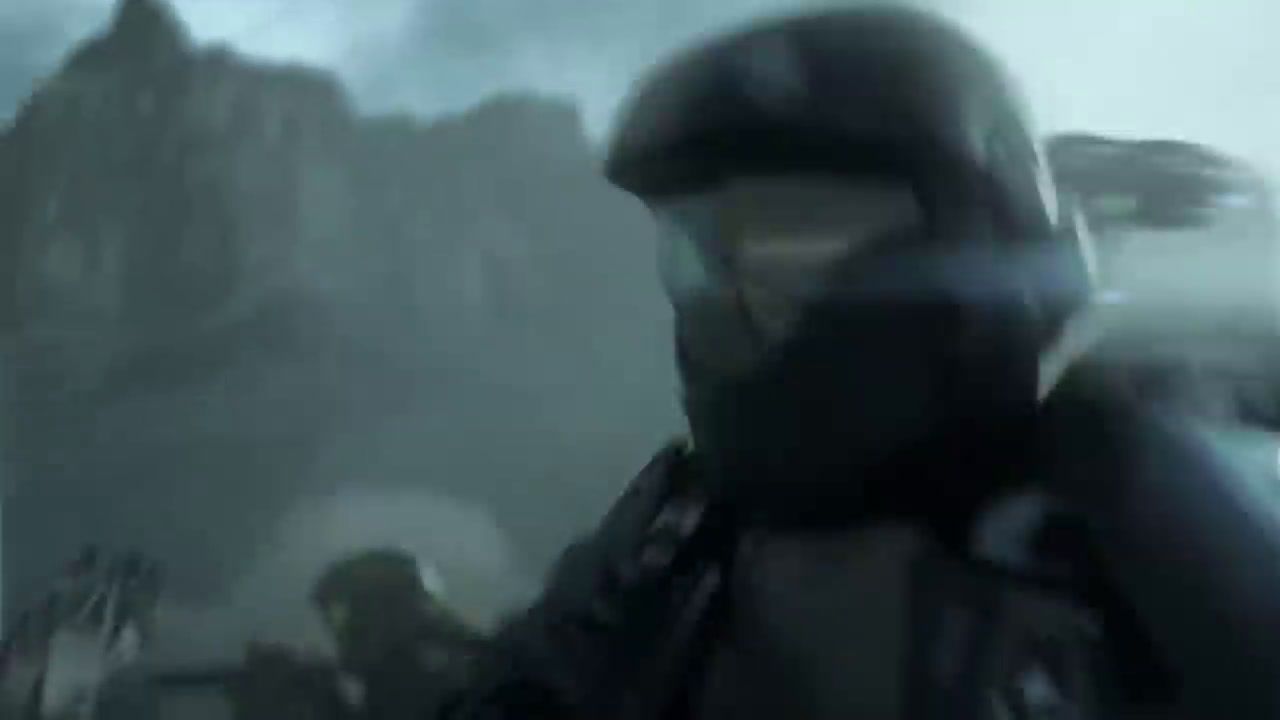 a blurry image of a man in a helmet