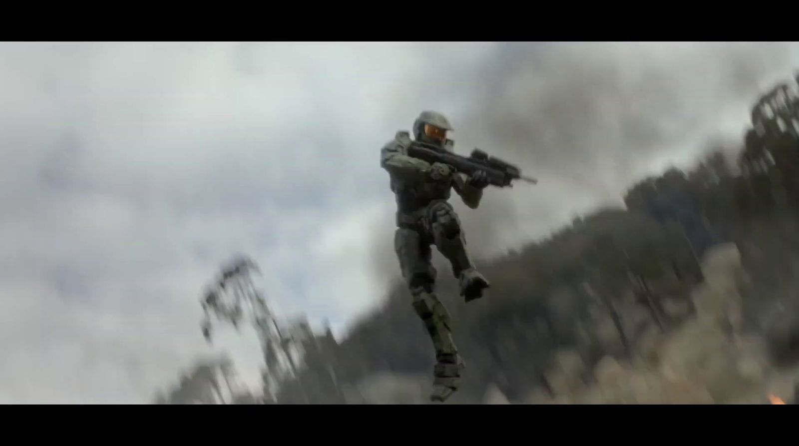 a man flying through the air while holding a gun