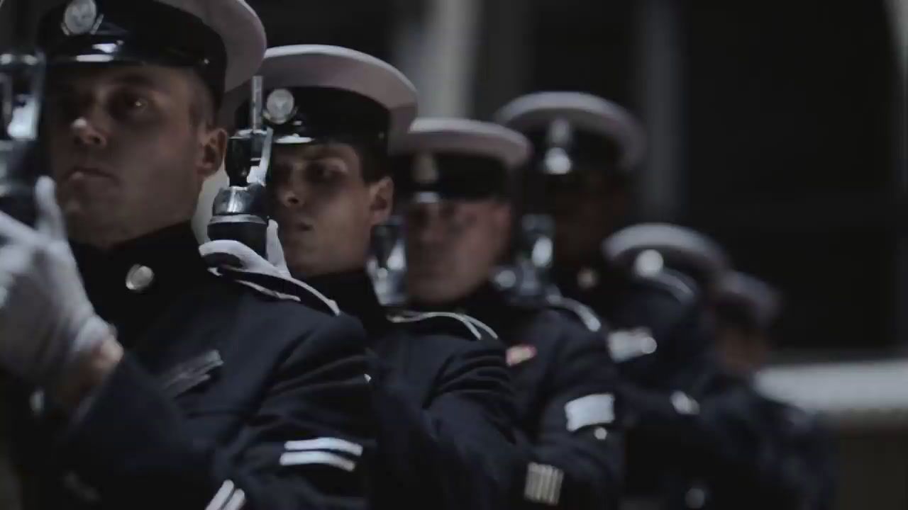 a group of uniformed men standing next to each other