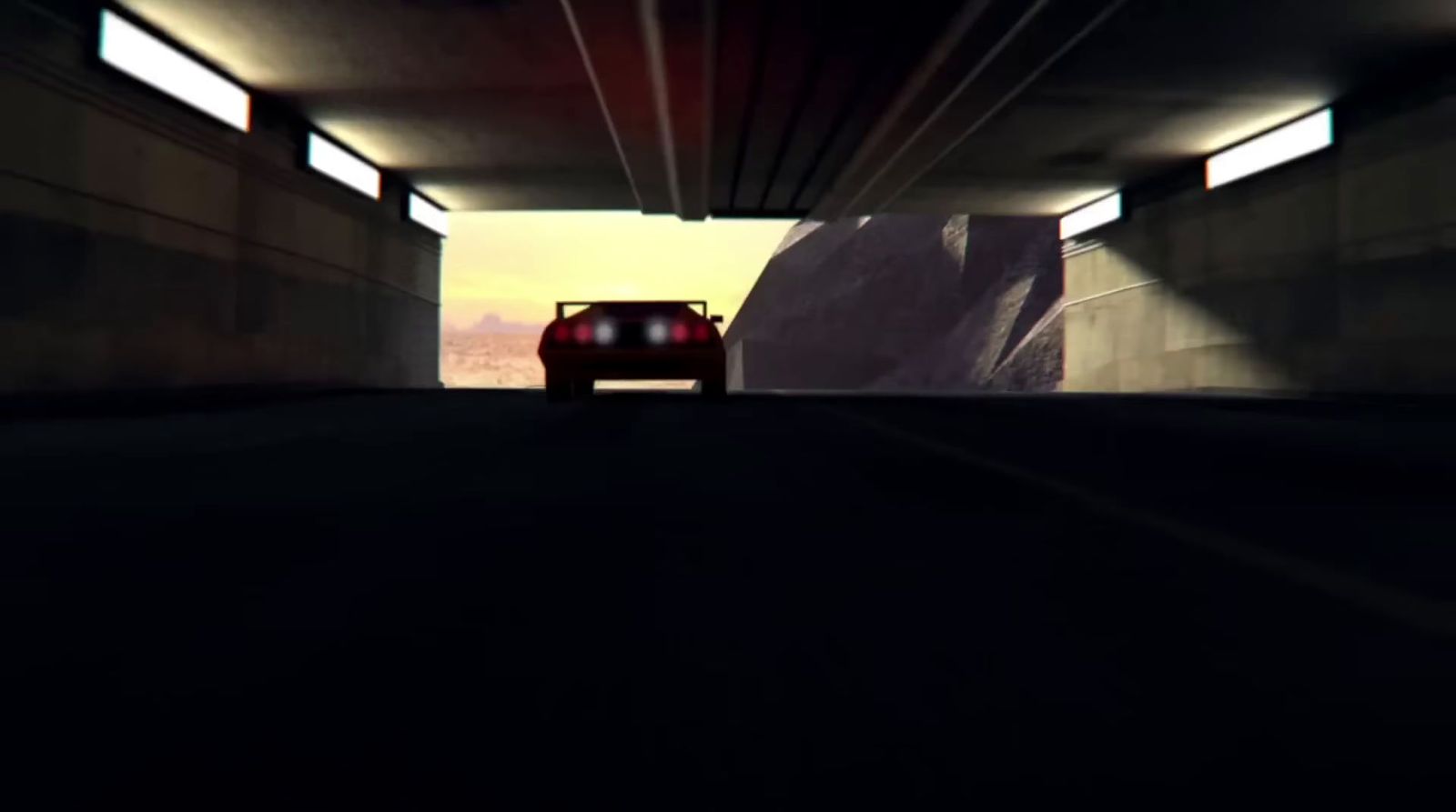 a red car driving through a tunnel under a bridge