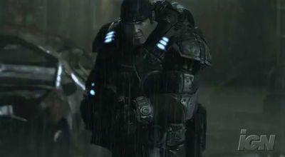 a man in a futuristic suit standing in the rain