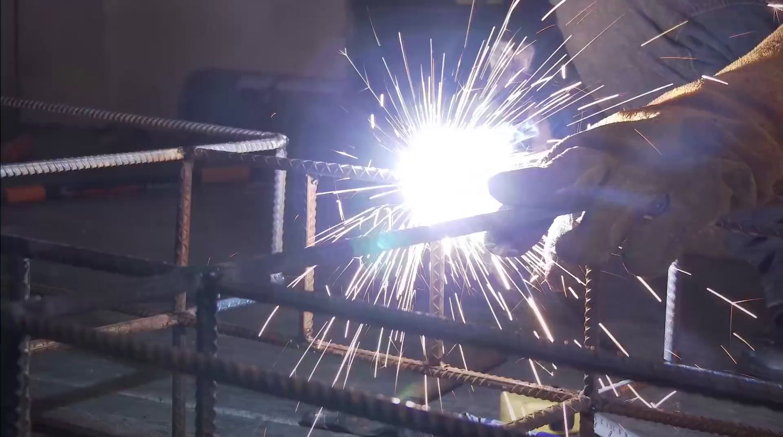 a welder working on a piece of metal