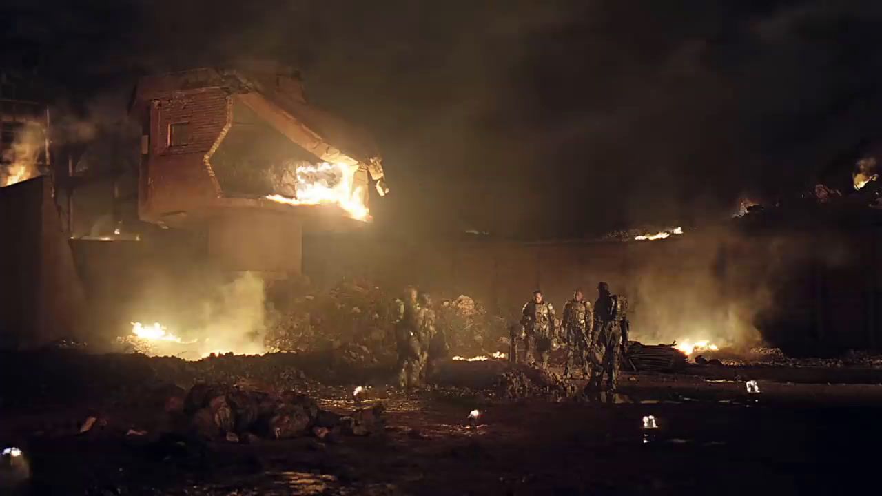 a house on fire with a lot of smoke coming out of it