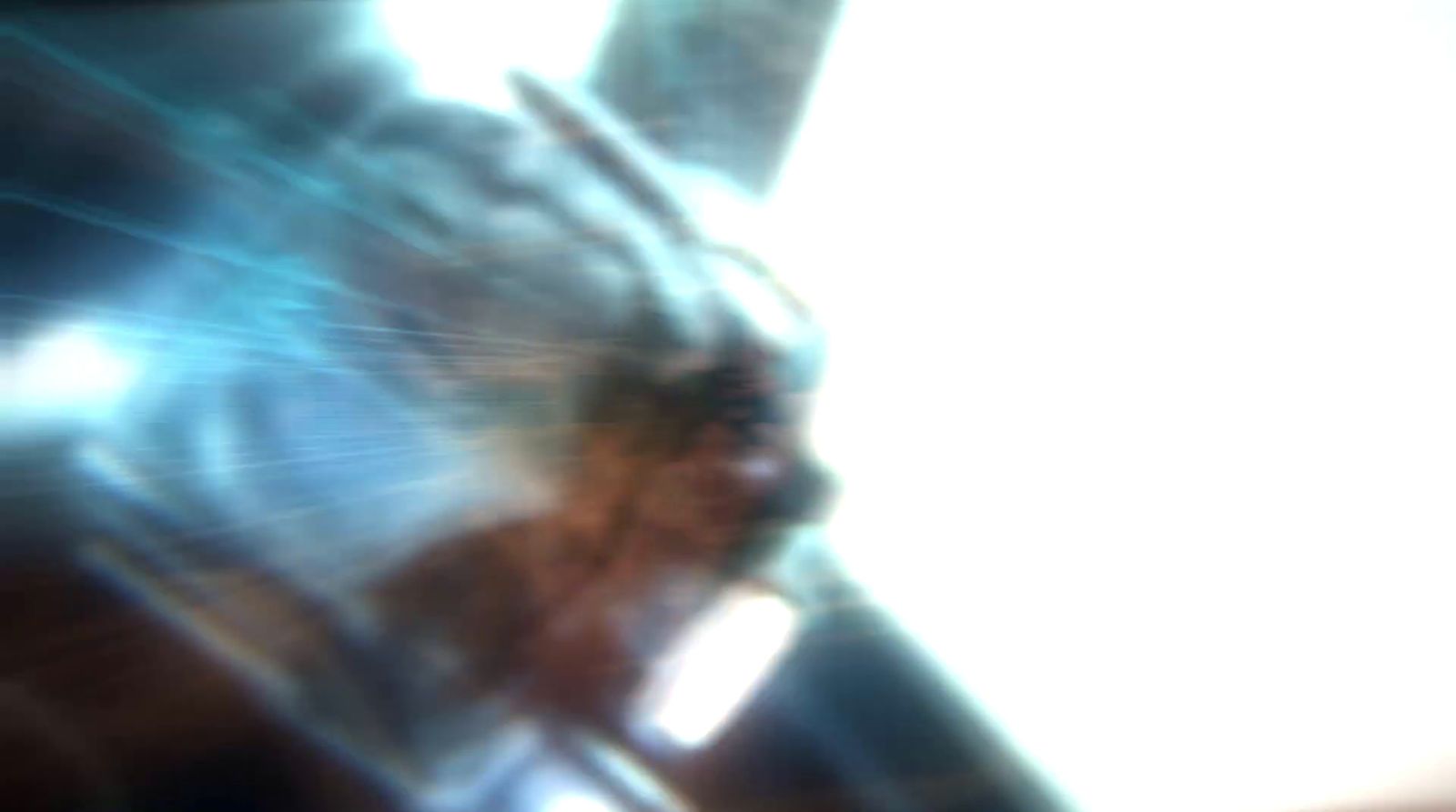 a blurry photo of a person holding a cell phone