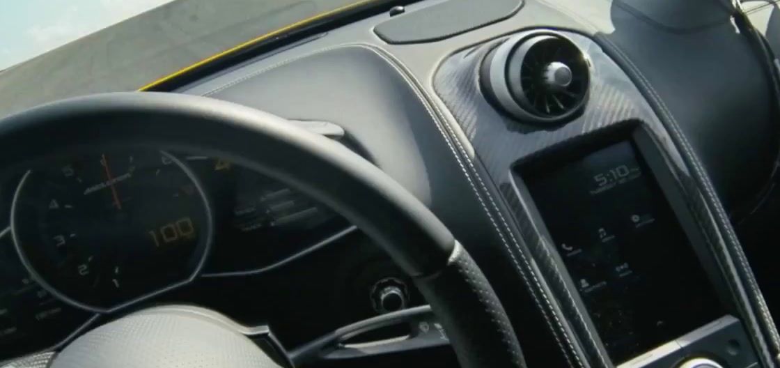 the dashboard of a car with a steering wheel